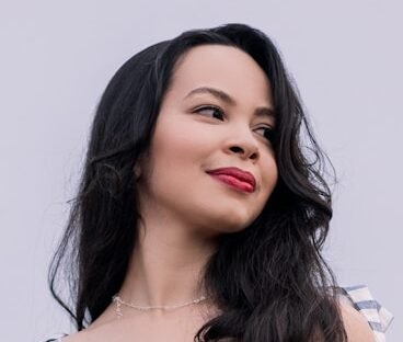 woman in white and black plaid sleeveless dress